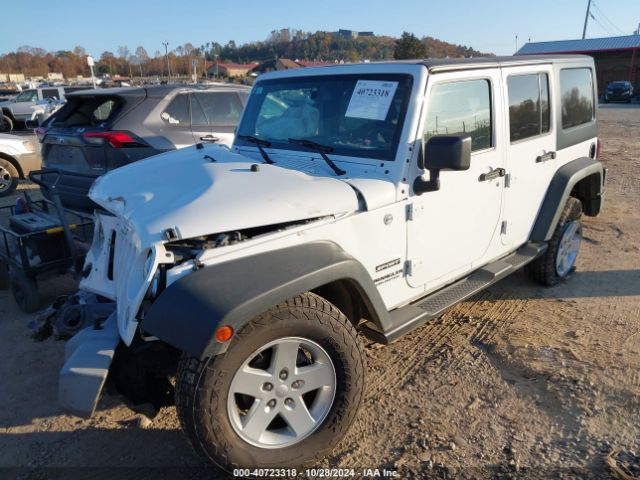 1C4BJWDG4FL749956 Jeep Wrangler Unlimited Sport