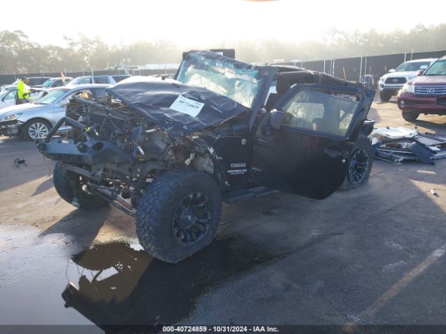 1C4BJWDG7EL119878 Jeep Wrangler Unlimited Sport