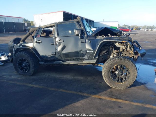 1C4BJWDG7EL119878 Jeep Wrangler Unlimited Sport