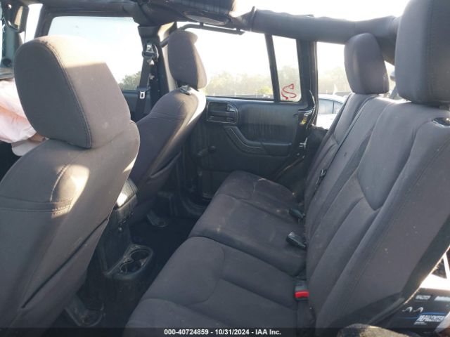 1C4BJWDG7EL119878 Jeep Wrangler Unlimited Sport