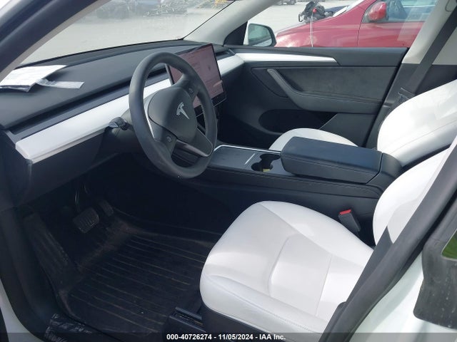 2023 TESLA MODEL Y 7SAYGDEE8PF817225 Photo 4