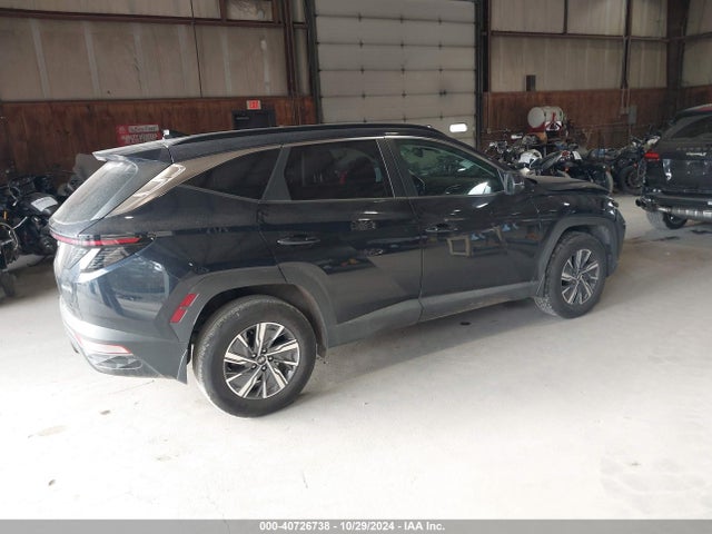 KM8JBCA10NU063912 Hyundai Tucson Hybrid Blue