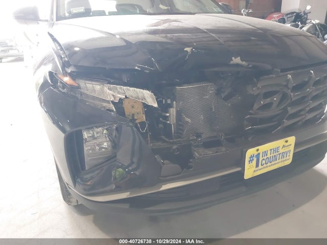 KM8JBCA10NU063912 Hyundai Tucson Hybrid Blue