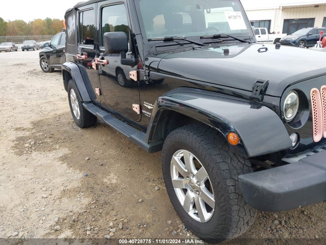 1C4BJWEG7EL288037 Jeep Wrangler Unlimited Sahara