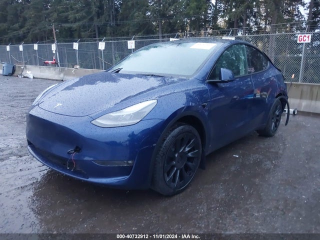 2024 TESLA MODEL Y 7SAYGDEE8RF114761 Photo 1