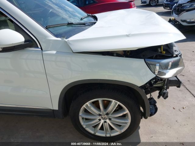 WVGAV3AXXEW561728 Volkswagen Tiguan Sel