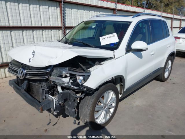 WVGAV3AXXEW561728 Volkswagen Tiguan Sel