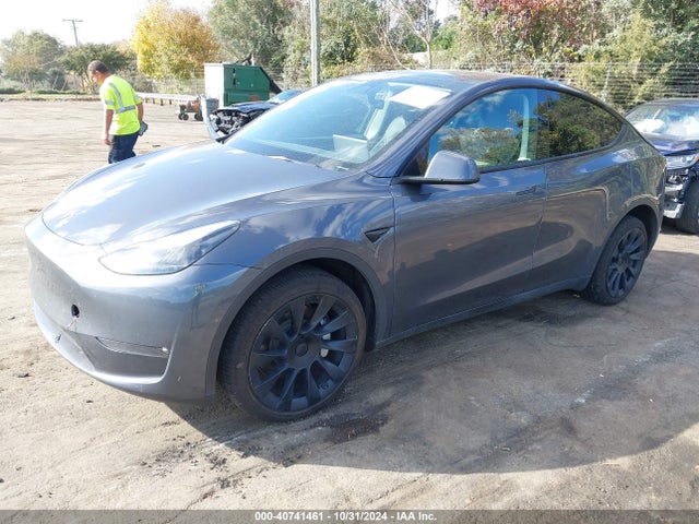 2023 TESLA MODEL Y 7SAYGDEE1PF698207 Photo 1