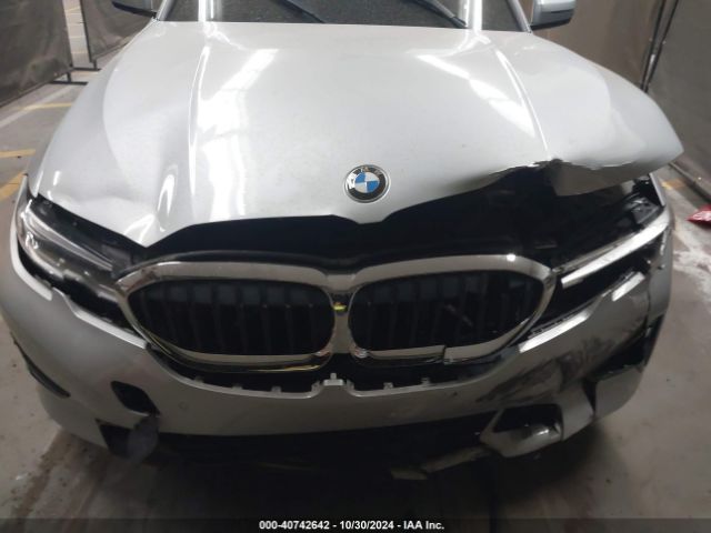 WBA5R1C59KAK09028 BMW 330I