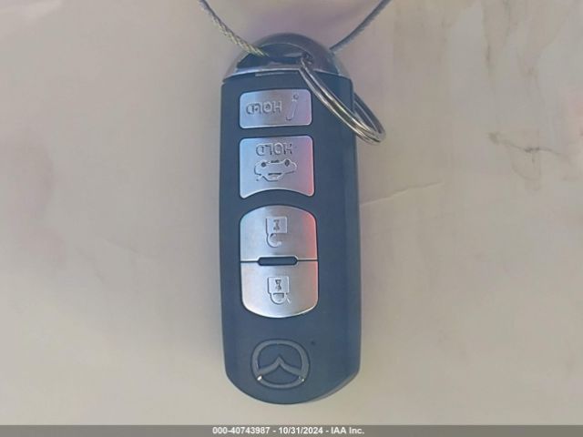 JM1NDAD74G0115881 Mazda Mx-5 Miata Grand Touring
