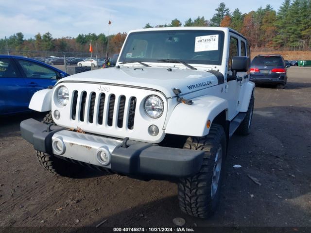 1C4BJWEG5FL704104 Jeep Wrangler Unlimited Sahara