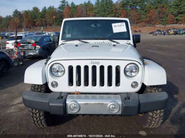 1C4BJWEG5FL704104 Jeep Wrangler Unlimited Sahara
