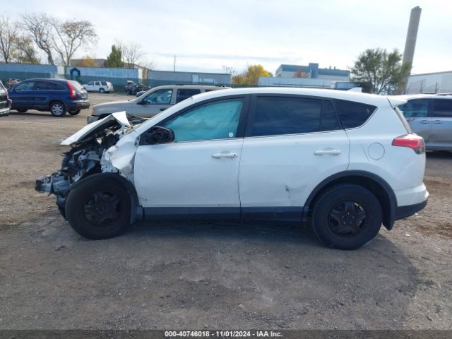 2T3BFREV3JW848662 Toyota RAV4 LE
