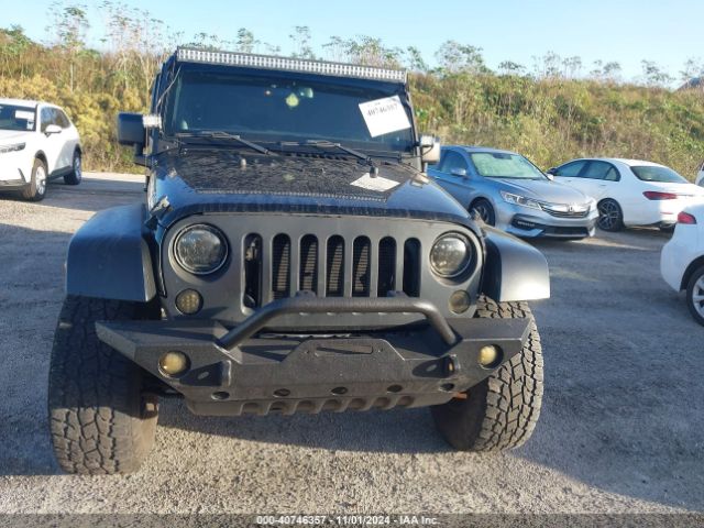1C4BJWFG1EL165915 Jeep Wrangler Unlimited Rubicon