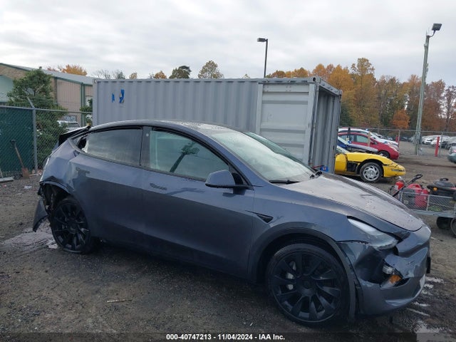 2023 TESLA MODEL Y 7SAYGDEE4PF689677 Photo 0