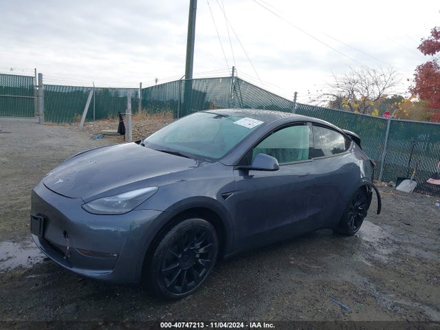 2023 TESLA MODEL Y 7SAYGDEE4PF689677 Photo 1