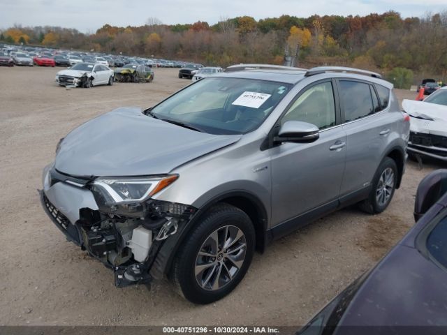 JTMRJREV9JD166184 Toyota Rav4 Hybrid Xle