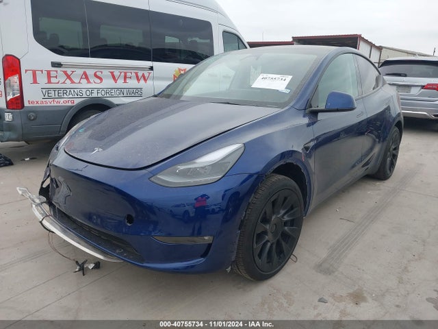 2024 TESLA MODEL Y 7SAYGAEE7RF102521 Photo 1