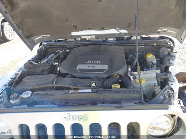 1C4BJWEG7EL204363 Jeep Wrangler Unlimited Sahara