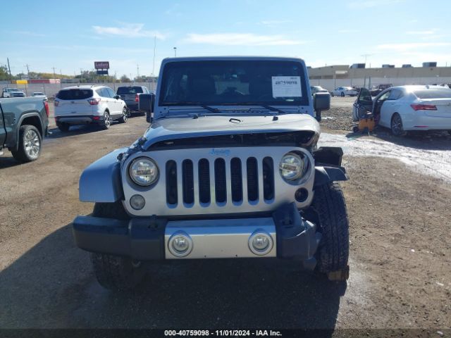 1C4BJWEG7EL204363 Jeep Wrangler Unlimited Sahara