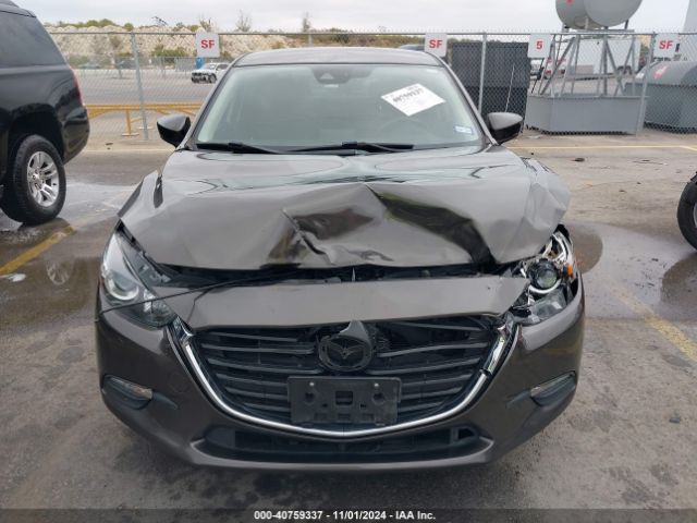 3MZBN1V3XJM161003 Mazda Mazda3 Touring