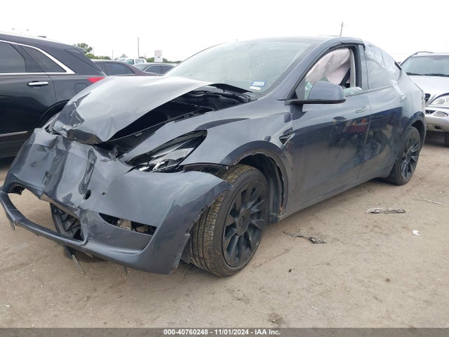 2023 TESLA MODEL Y 7SAYGAEE6PF630077 Photo 1
