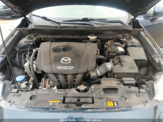 JM1DKDC76K0402555 Mazda Cx-3 Touring