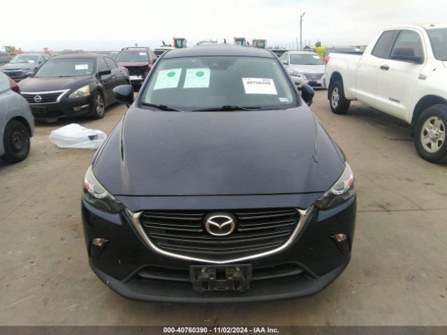 JM1DKDC76K0402555 Mazda Cx-3 Touring