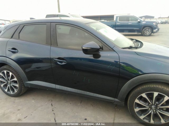 JM1DKDC76K0402555 Mazda Cx-3 Touring