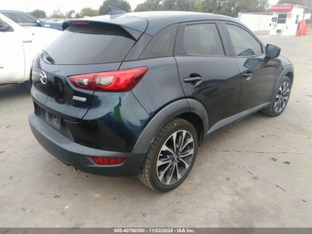 JM1DKDC76K0402555 Mazda Cx-3 Touring