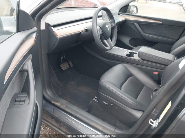 2023 TESLA MODEL Y 7SAYGDED6PF947091 Photo 4