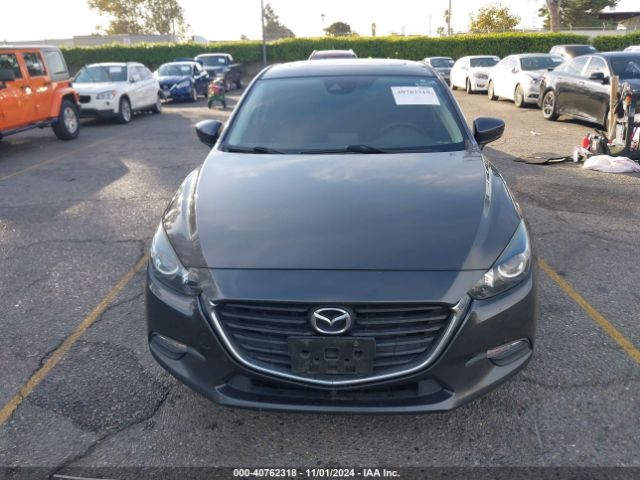 3MZBN1V3XJM253034 Mazda Mazda3 Touring