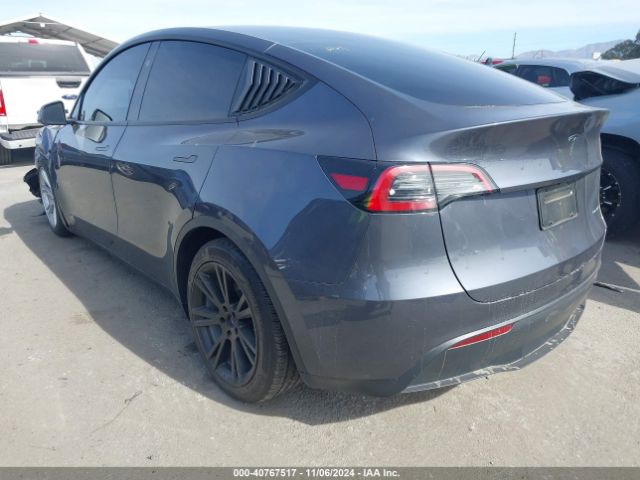 2023 TESLA MODEL Y 7SAYGDEE5PF909067 Photo 2