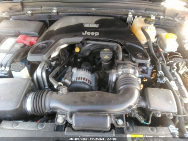 1C4HJXEG9KW525203 Jeep Wrangler Unlimited Sahara 4x4