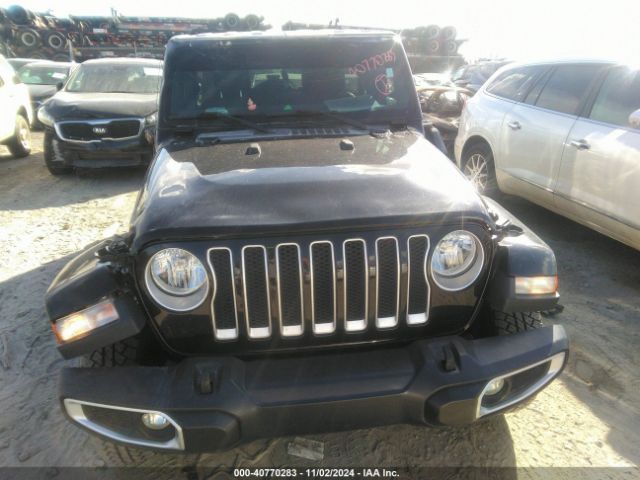 1C4HJXEG9KW525203 Jeep Wrangler Unlimited Sahara 4x4