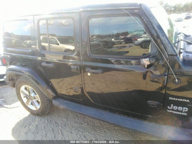 1C4HJXEG9KW525203 Jeep Wrangler Unlimited Sahara 4x4