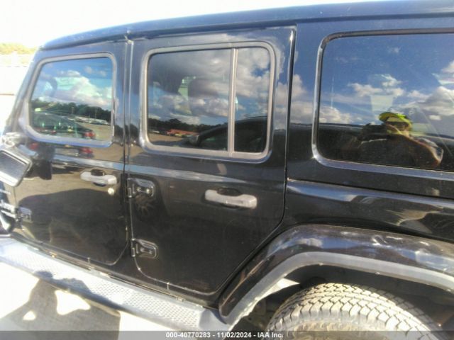 1C4HJXEG9KW525203 Jeep Wrangler Unlimited Sahara 4x4