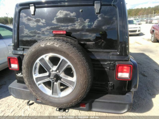 1C4HJXEG9KW525203 Jeep Wrangler Unlimited Sahara 4x4