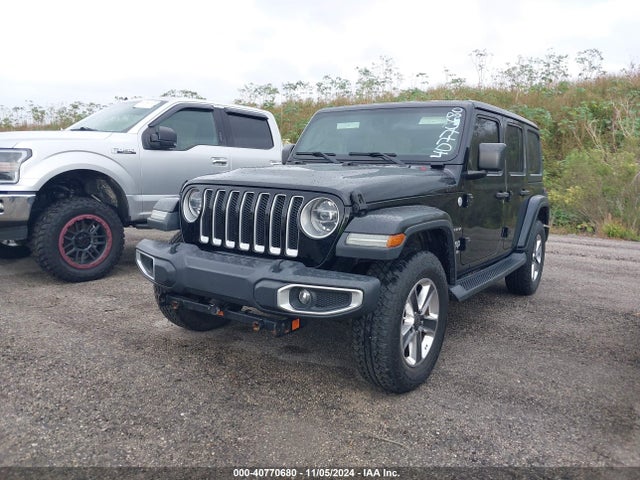 1C4HJXEG6JW110936 Jeep Wrangler Unlimited Sahara 4x4