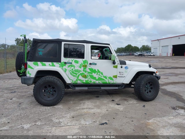 1C4BJWEG9GL142841 Jeep Wrangler Unlimited Sahara