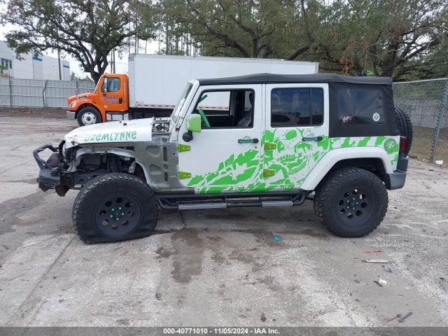 1C4BJWEG9GL142841 Jeep Wrangler Unlimited Sahara
