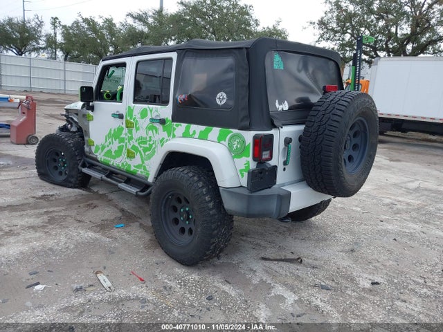 1C4BJWEG9GL142841 Jeep Wrangler Unlimited Sahara