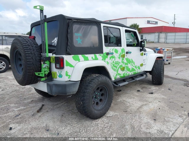 1C4BJWEG9GL142841 Jeep Wrangler Unlimited Sahara