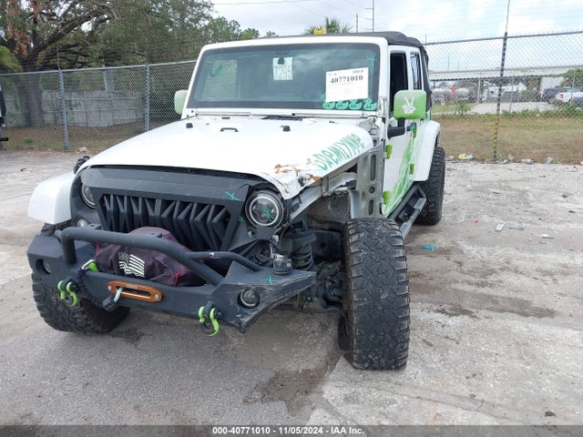 1C4BJWEG9GL142841 Jeep Wrangler Unlimited Sahara