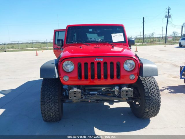 1C4HJWDG6GL232850 Jeep Wrangler Unlimited Sport