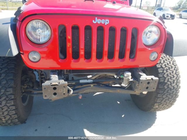 1C4HJWDG6GL232850 Jeep Wrangler Unlimited Sport