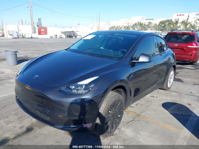 2024 TESLA MODEL Y 7SAYGDEE8RF064850 Photo 1