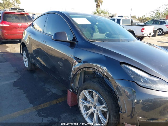 2024 TESLA MODEL Y 7SAYGDEE8RF064850 Photo 5