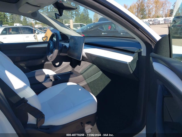 2023 TESLA MODEL Y 7SAYGDEE3PF635688 Photo 4