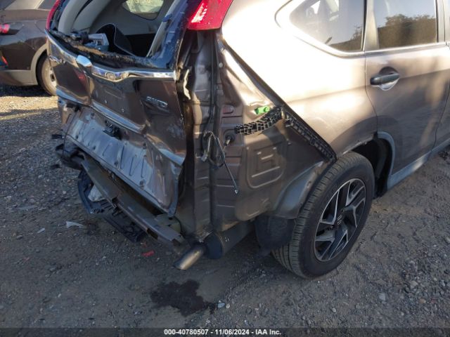 2HKRM4H45GH693428 Honda CR-V SE